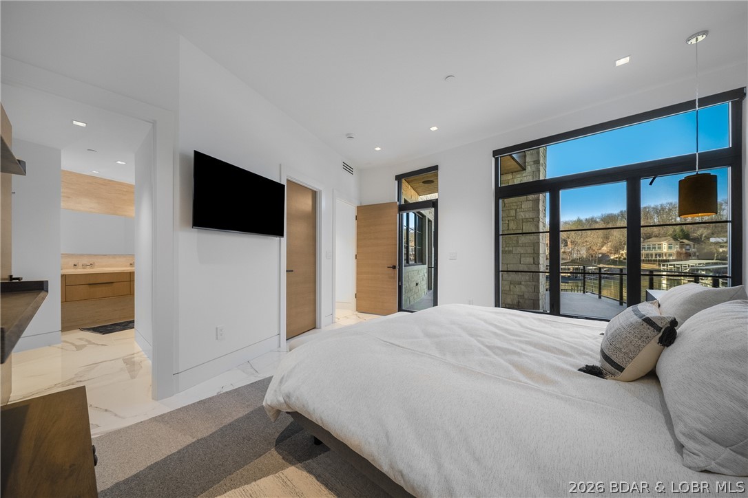 245 Waterview Ridge Sunrise Beach, MO 65079 - Photo 23 of 43 Lower Level Guest Suite