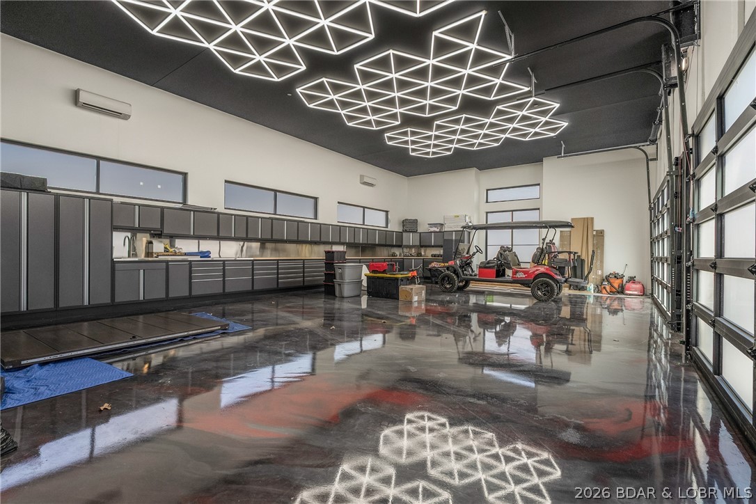 245 Waterview Ridge Sunrise Beach, MO 65079 - Photo 42 of 43 Four Car Garage Oversized & Tall Ceilings