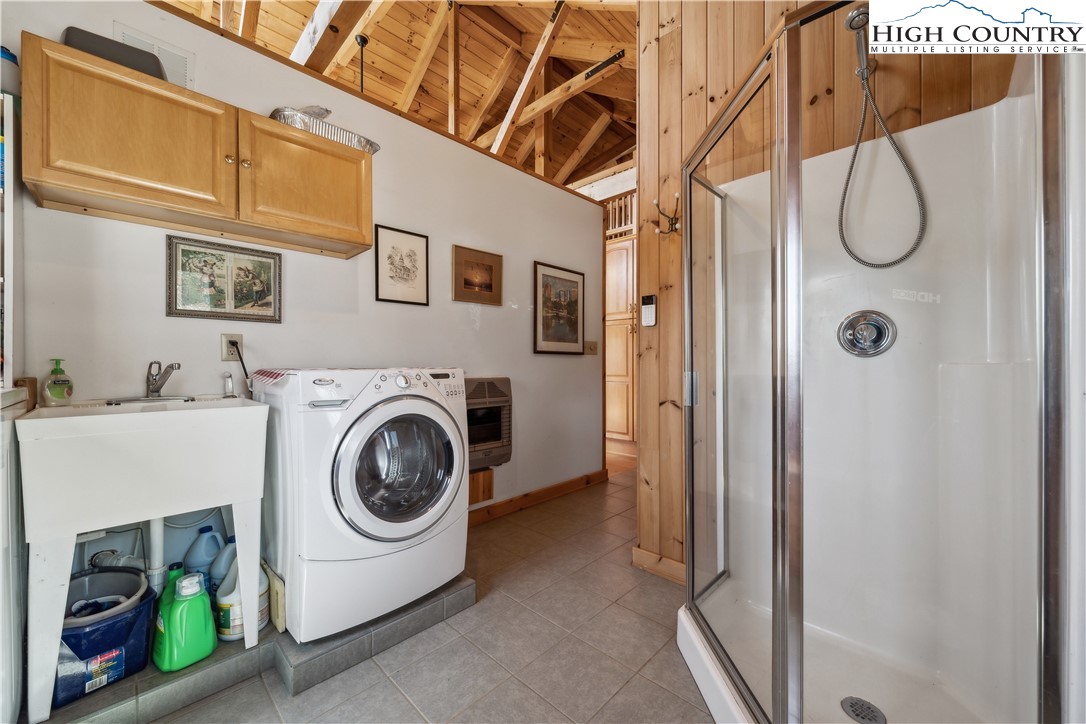 101 Double Branch Road Grassy Creek, NC 28631 - Photo 17 of 50 a utility room with dryer and washer
