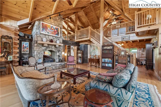 a view of a patio with a fire pit and chairs