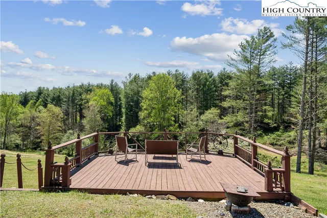 an aerial view of a deck having outdoor seating