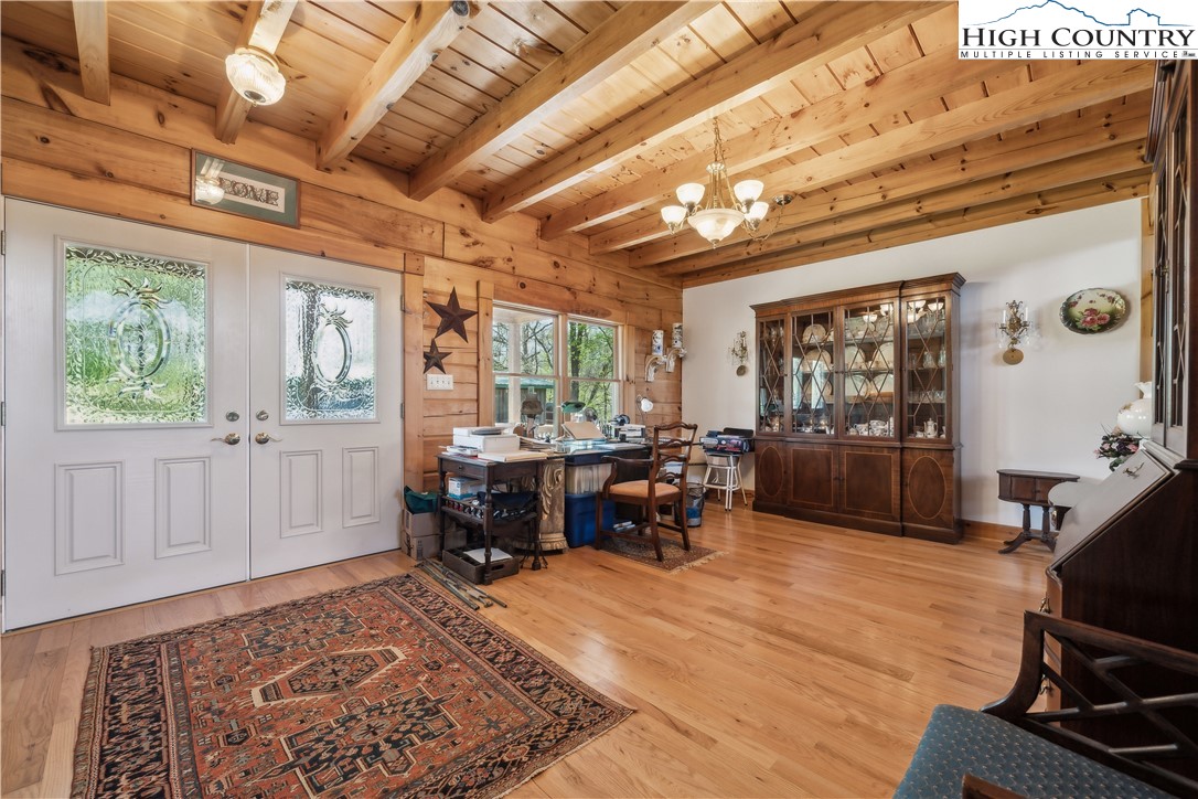 101 Double Branch Road Grassy Creek, NC 28631 - Photo 10 of 50 a living room with furniture a window and a table
