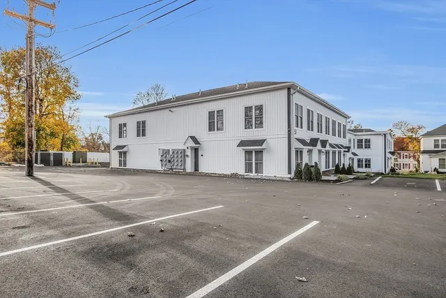 a view of a street with a building