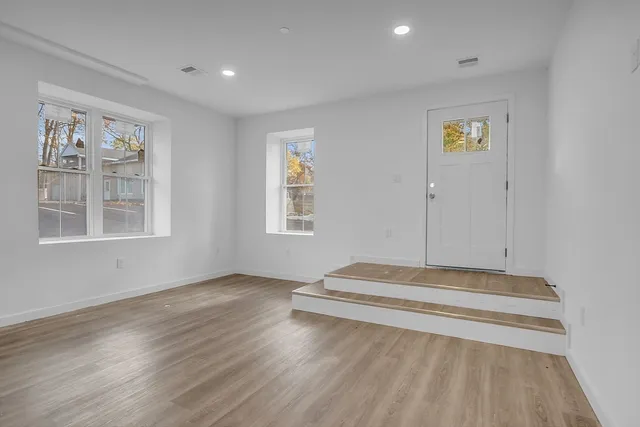 a view of livingroom with hardwood floor and window