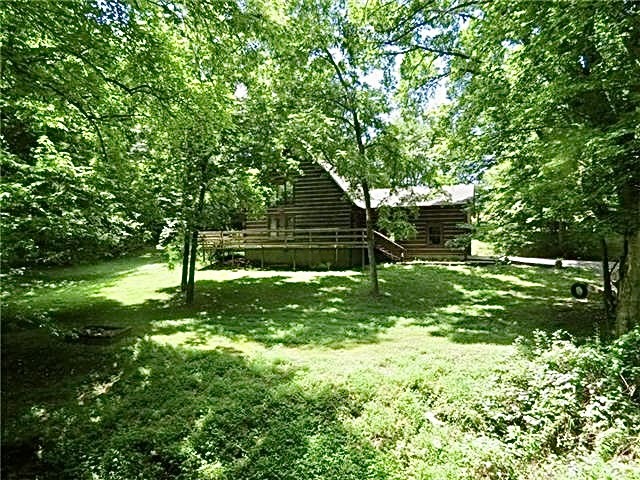 a view of a backyard with a garden