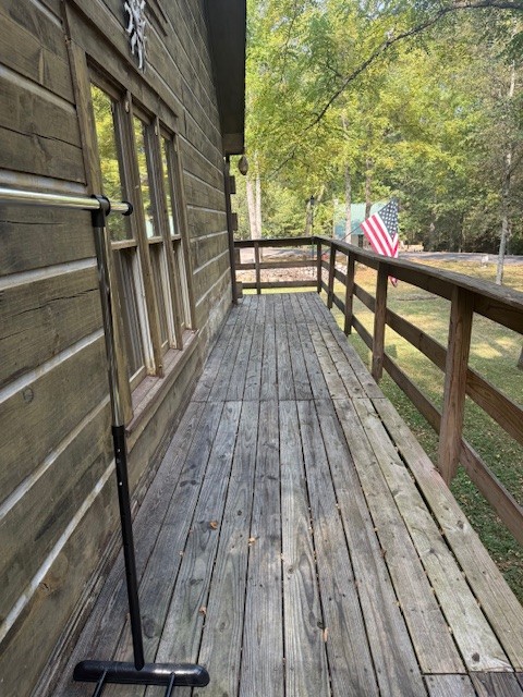 3103 Lipscomb Road Springfield, TN 37172 - Photo 15 of 30 a view of balcony with wooden floor and bench