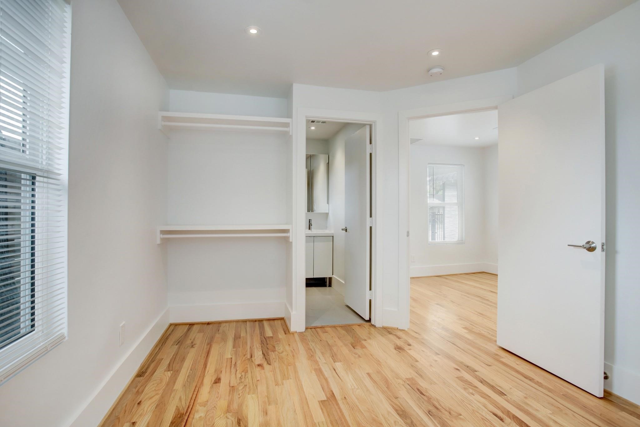 6109 North Main Street Houston, TX 77008 - Photo 8 of 16 a view of empty room with wooden floor