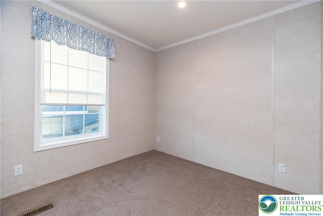 465 Royal Manor Road, Unit LOT 5 Easton, PA 18042 - Photo 13 of 24 an empty room with a window