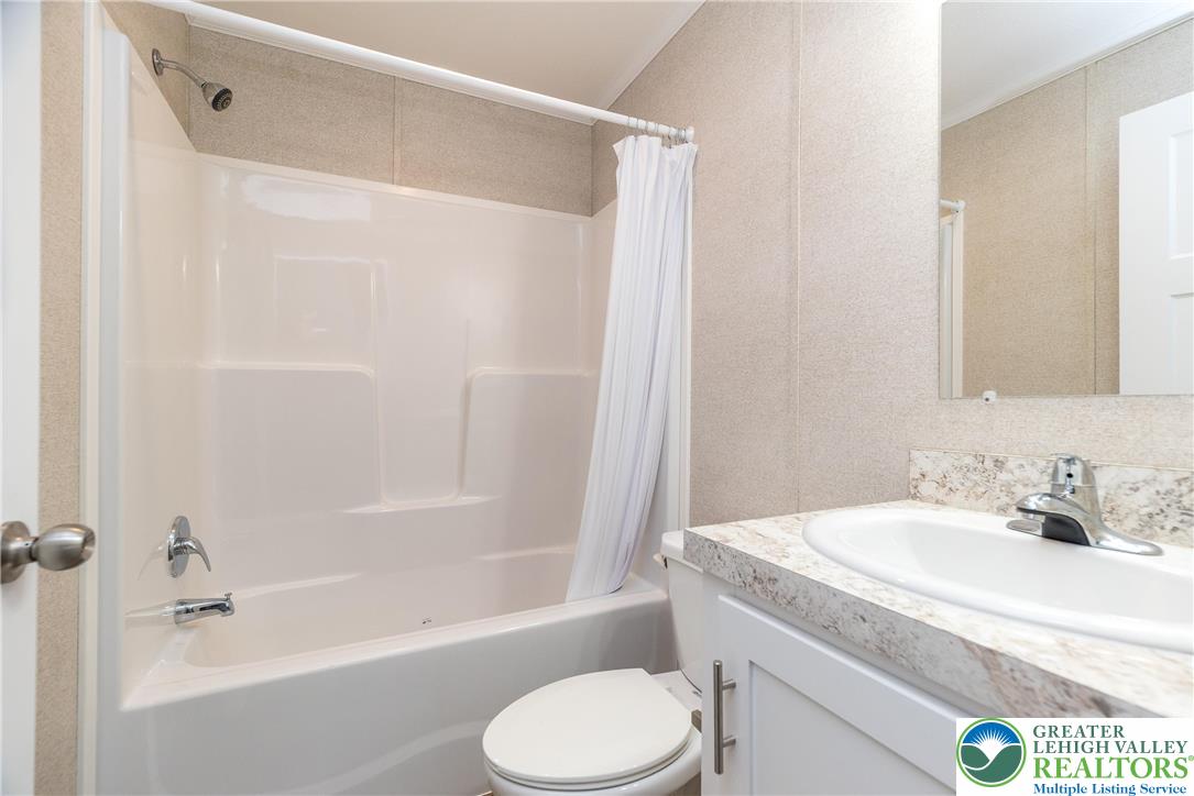 465 Royal Manor Road, Unit LOT 5 Easton, PA 18042 - Photo 14 of 24 a bathroom with a sink toilet and shower