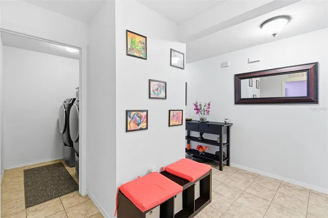 a living room with furniture and a table