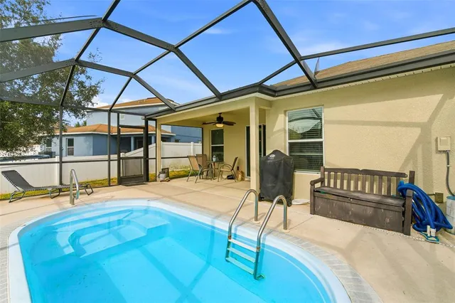 a view of a living room and a large window