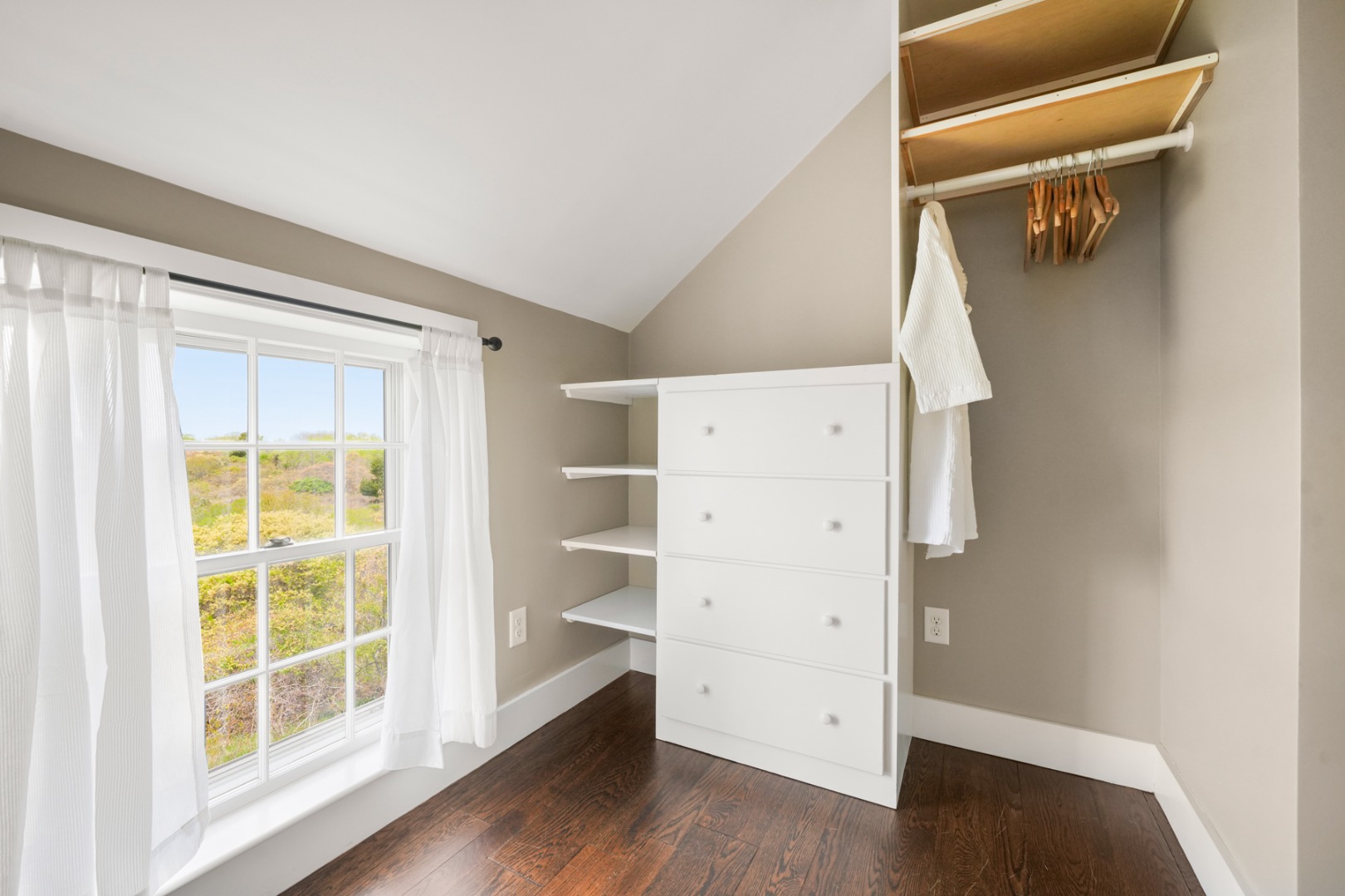 21 Quidnet Road Nantucket, MA 02554 - Photo 50 of 62 a view of walk in closet with empty racks