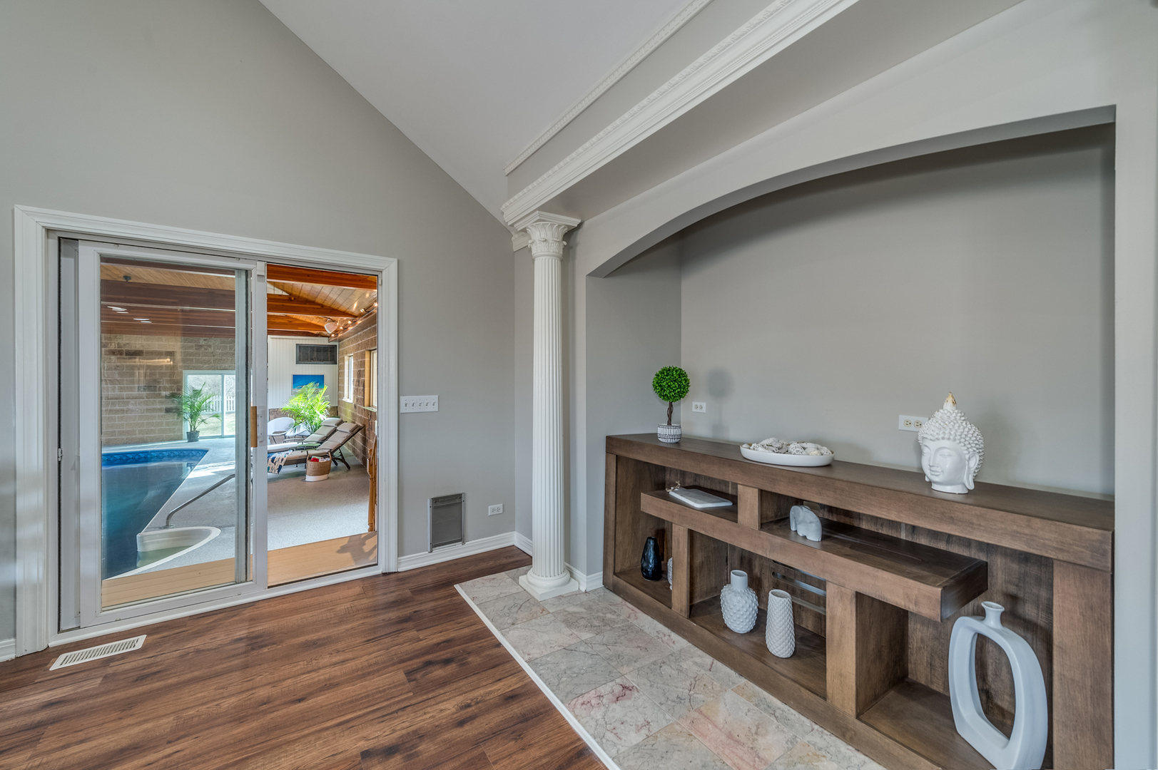 7206 South Solon Road Spring Grove, IL 60081 - Photo 50 of 59 a view of an empty room with wooden floor and a window