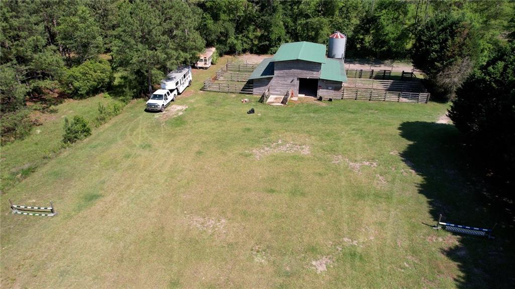 947 Bellhouse Road Macon, GA 31217 - Photo 103 of 132 a house with swimming pool in front of it