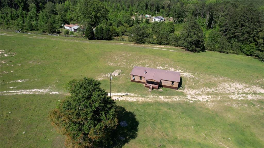 947 Bellhouse Road Macon, GA 31217 - Photo 118 of 132 an aerial view of a house with a yard basket ball court and outdoor seating