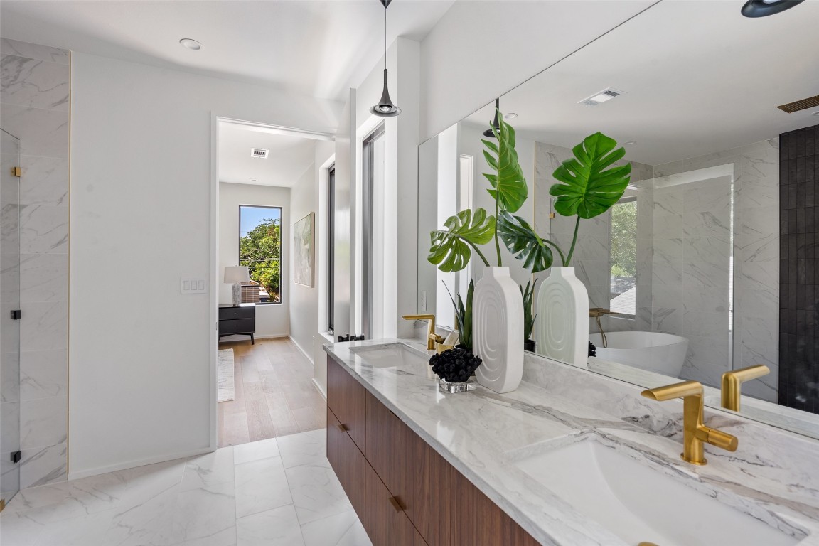 1203 Richcreek Road Austin, TX 78757 - Photo 14 of 28 a living room with furniture and potted plant