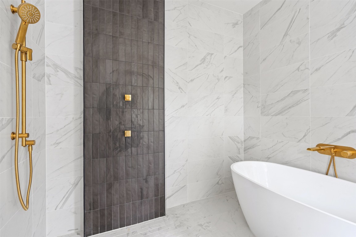 1203 Richcreek Road Austin, TX 78757 - Photo 16 of 28 a bathroom with a shower