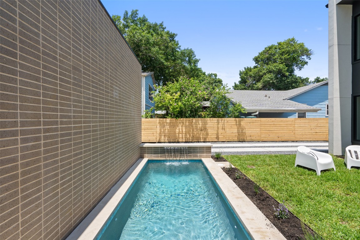 1203 Richcreek Road Austin, TX 78757 - Photo 25 of 28 a view of a backyard with a garden