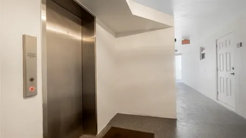 a view of a city with tall buildings