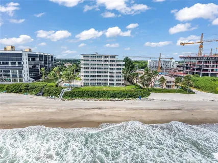 a view of a terrace with a garden
