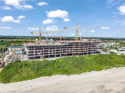 a view of a balcony with a city view