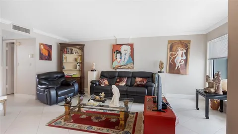 a view of balcony with furniture