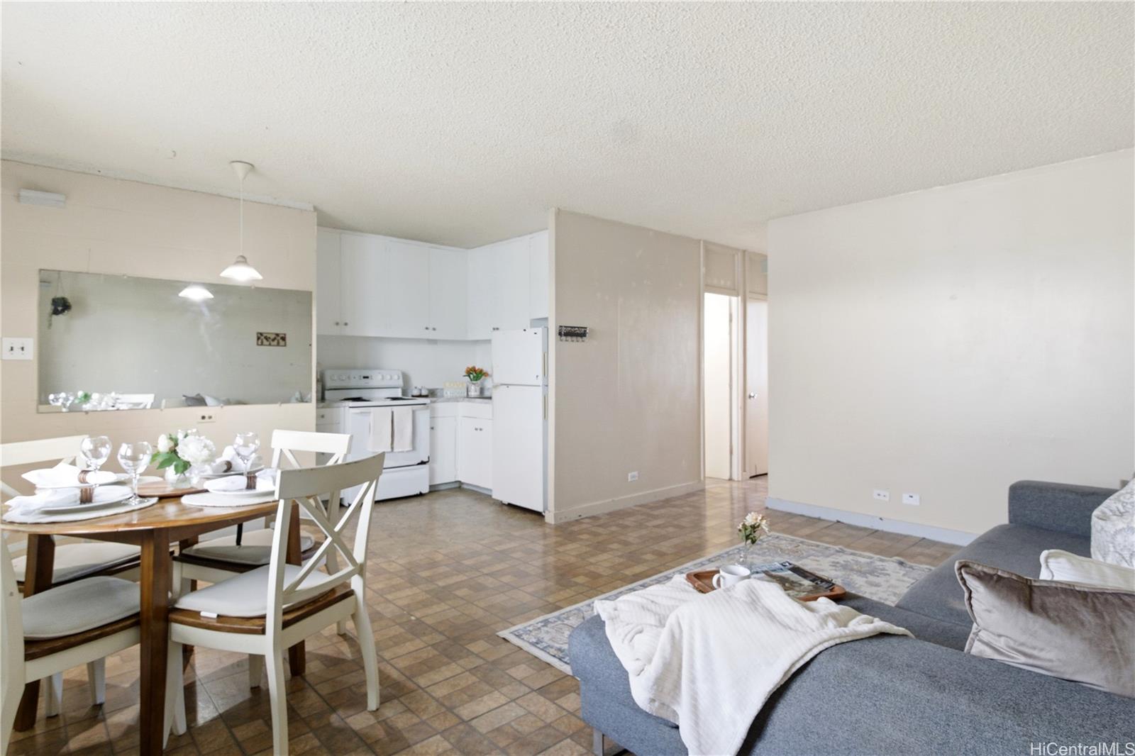 94-249 Waikele Road, Unit B313 Waipahu, HI 96797 - Photo 11 of 13 a bed room with a bed and furniture