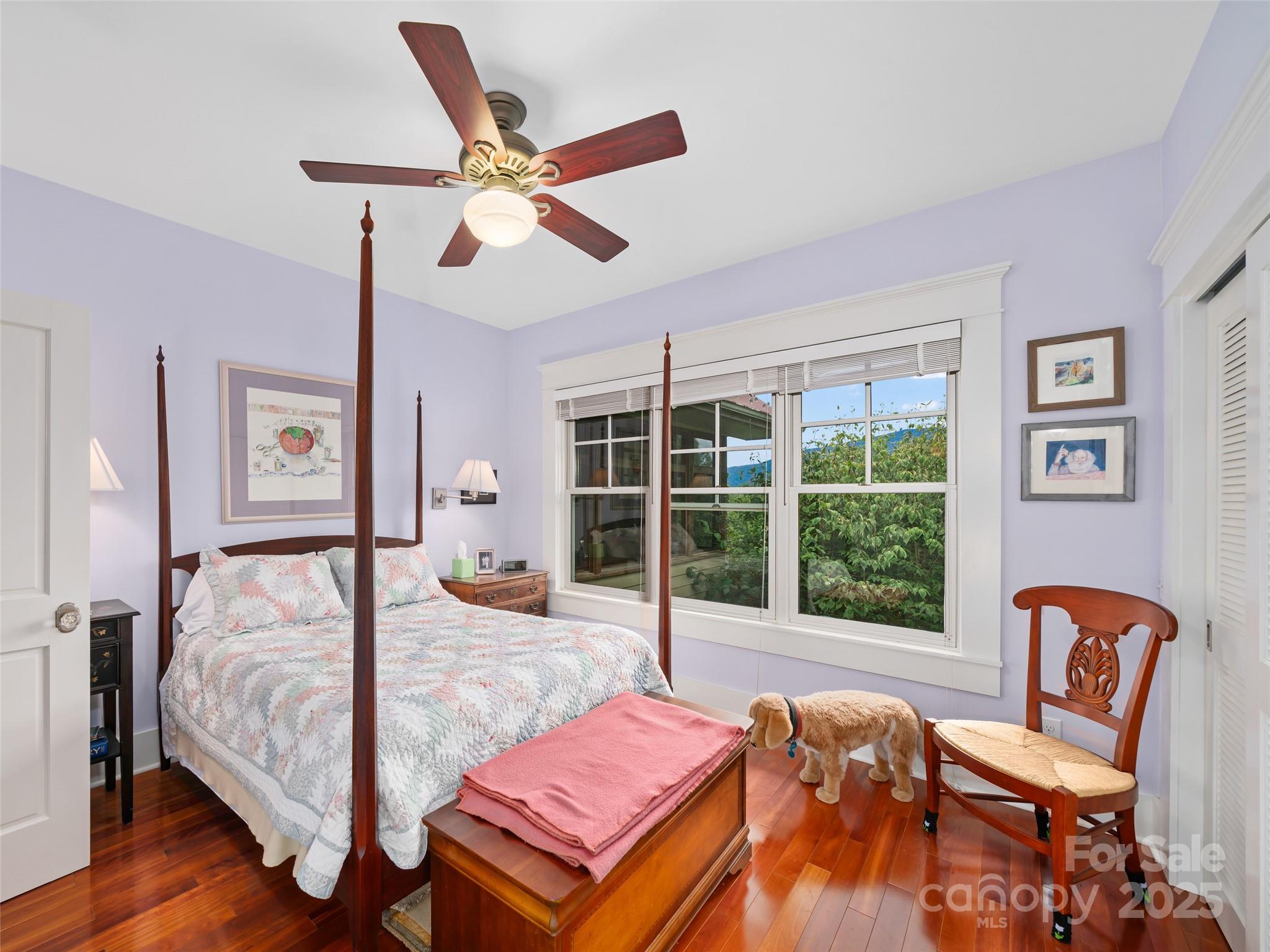 1992 Green Creek Road Bakersville, NC 28705 - Photo 18 of 48 a bedroom with a bed and wooden floor