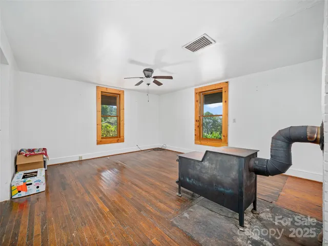 a view of livingroom with furniture and wooden floor