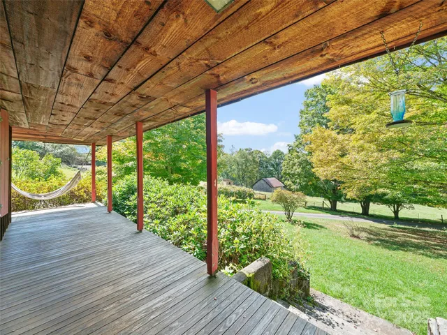 a view of yard with deck and outdoor space