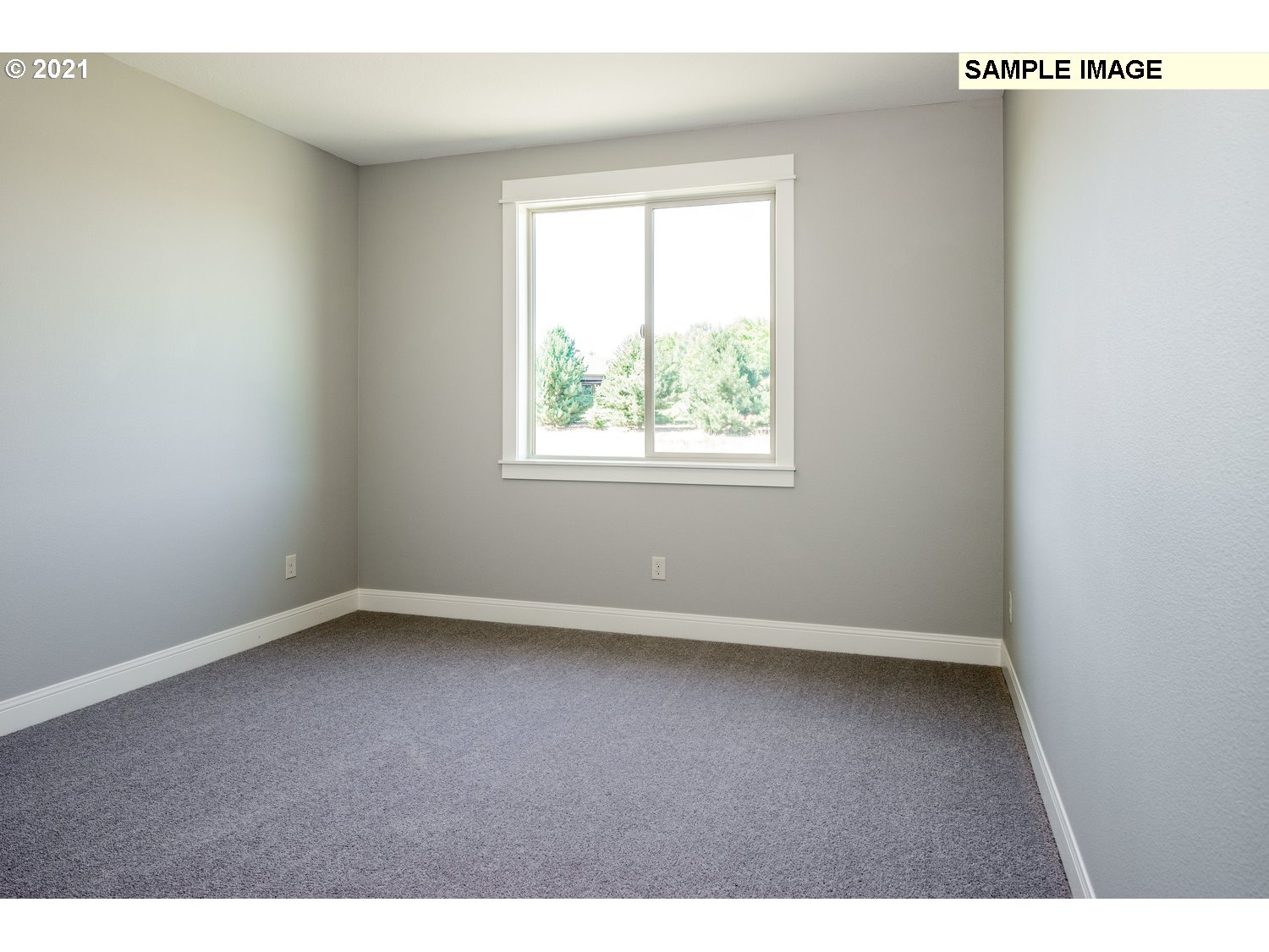 2938 South Cherry Grove Way Ridgefield, WA 98642 - Photo 13 of 20 an empty room with a window