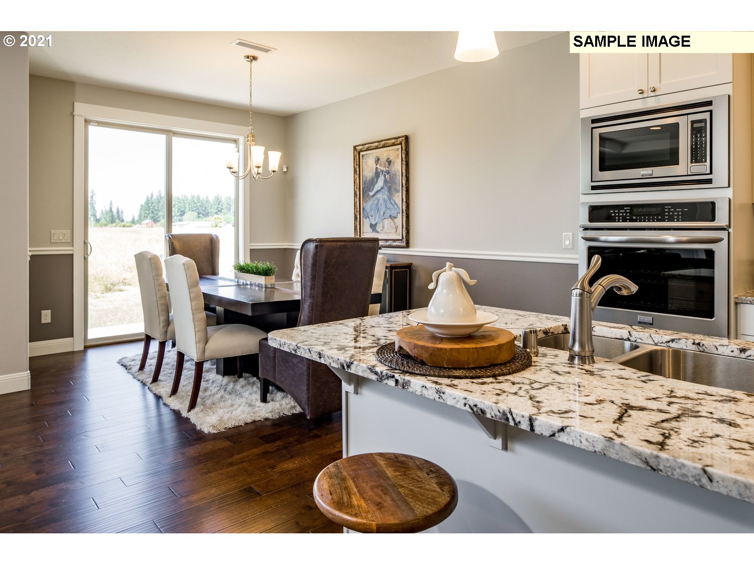 2938 South Cherry Grove Way Ridgefield, WA 98642 - Photo 8 of 20 a living room with furniture and flat screen tv