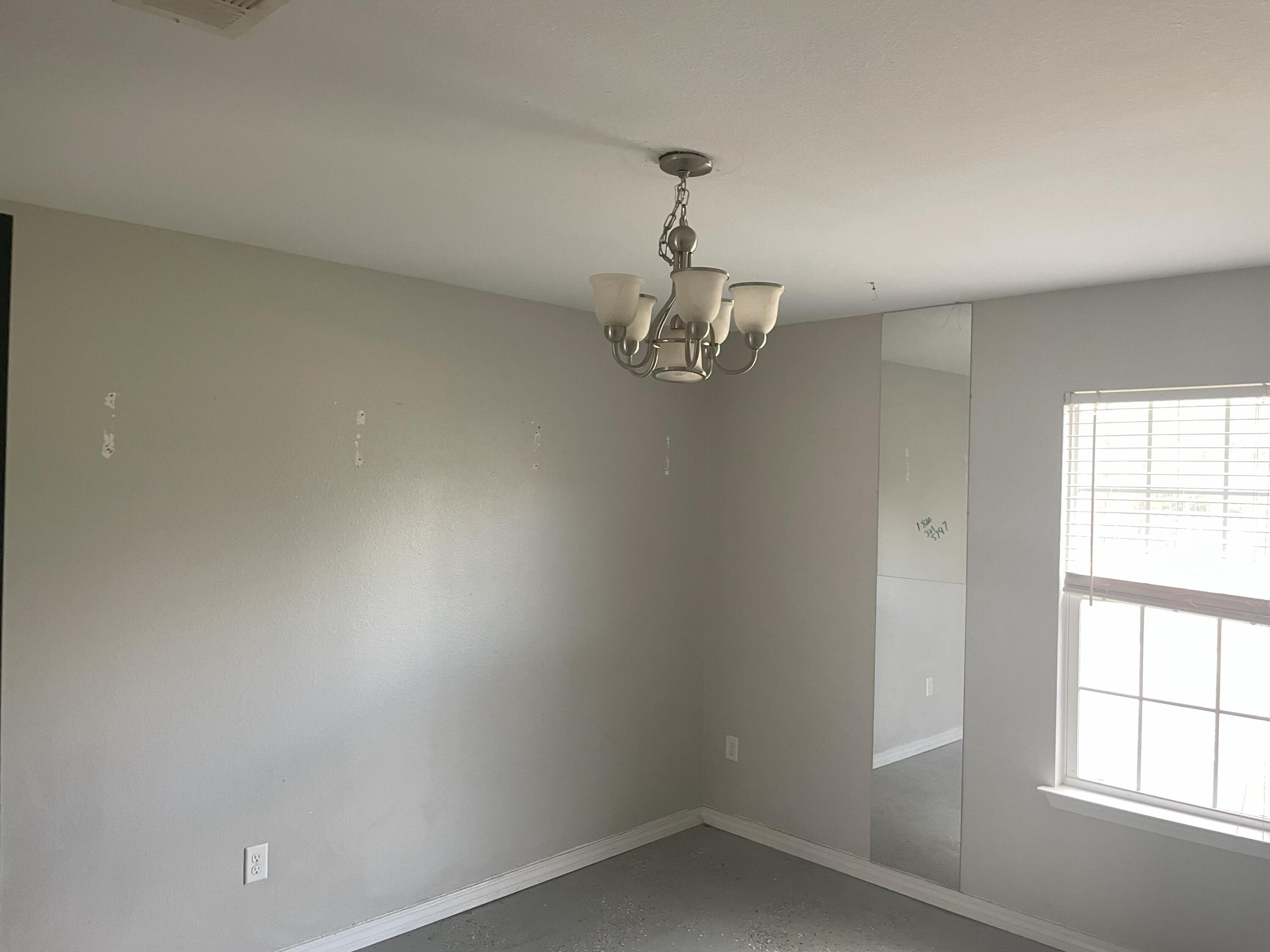 4052 Randi Road Crestview, FL 32539 - Photo 15 of 27 en empty room with a window