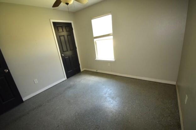 4052 Randi Road Crestview, FL 32539 - Photo 16 of 27 an empty room with a window