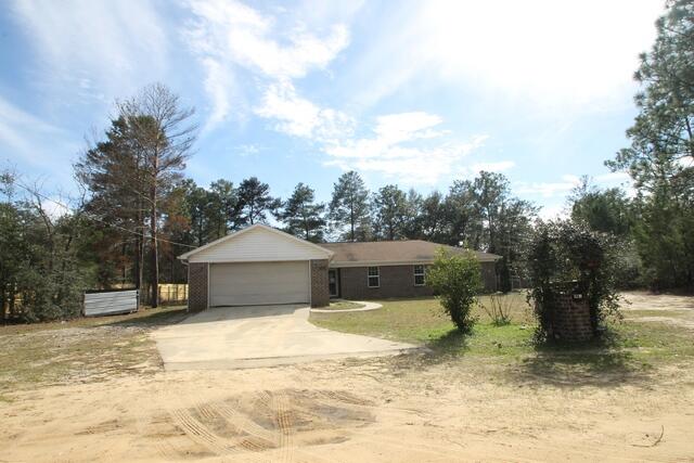 4052 Randi Road Crestview, FL 32539 - Photo 4 of 27 a view of a house with a yard