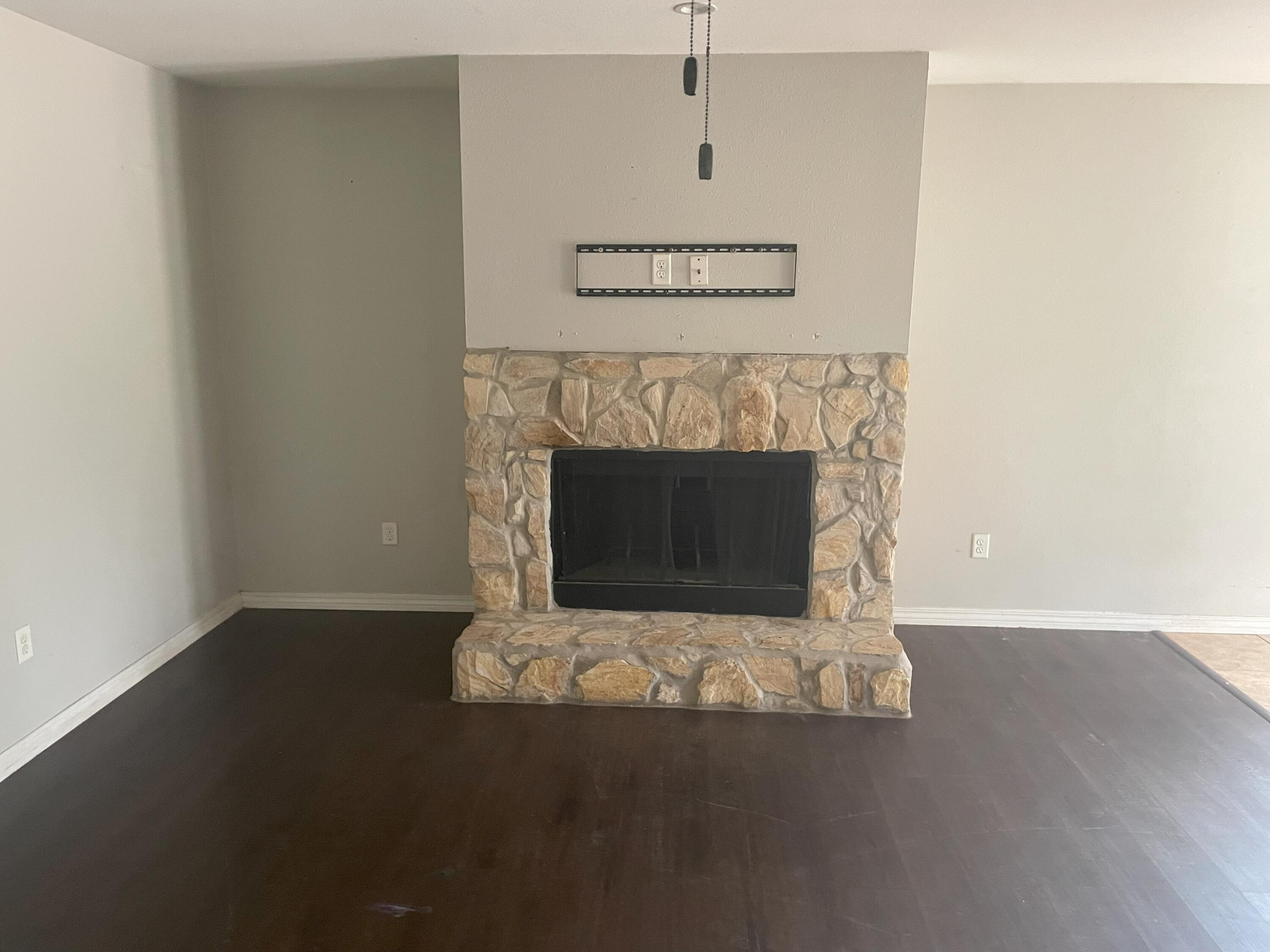 4052 Randi Road Crestview, FL 32539 - Photo 5 of 27 a living room with a fireplace