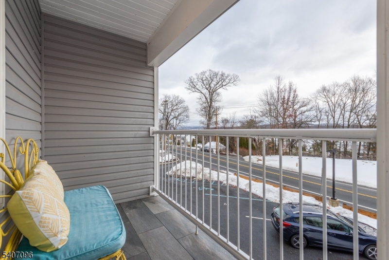 165 Lakeside Road, Unit 6 West Milford, NJ 07421 - Photo 14 of 23 a view of a balcony with furniture