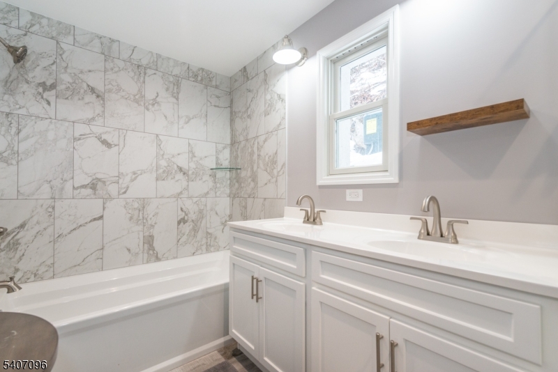 165 Lakeside Road, Unit 6 West Milford, NJ 07421 - Photo 15 of 23 a bathroom with a sink and a bathtub