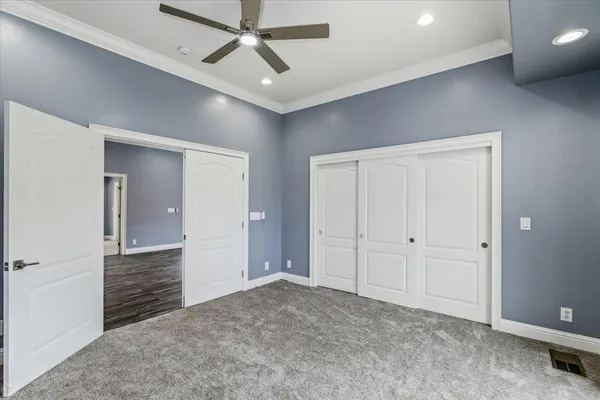 a bathroom with a black white checkered floor