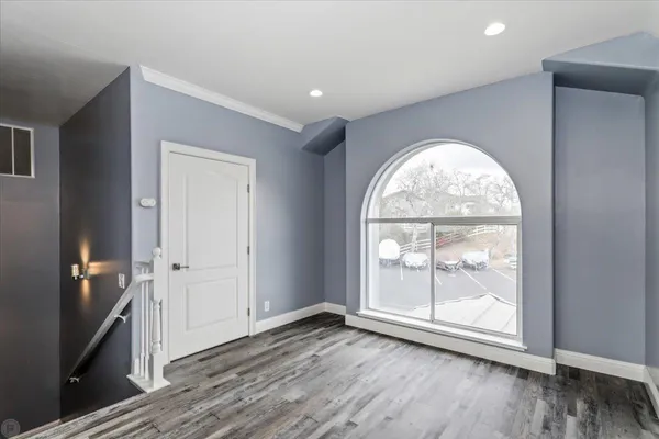 a bathroom with a granite countertop sink a mirror and vanity