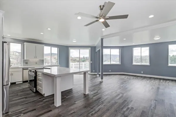 a view of an empty room and window