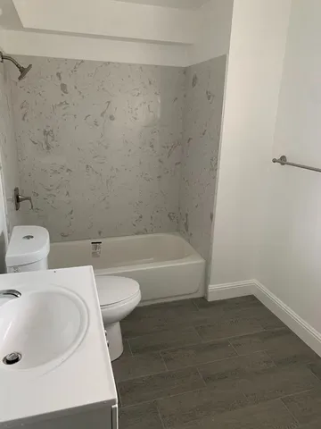 a bathroom with a sink and a toilet