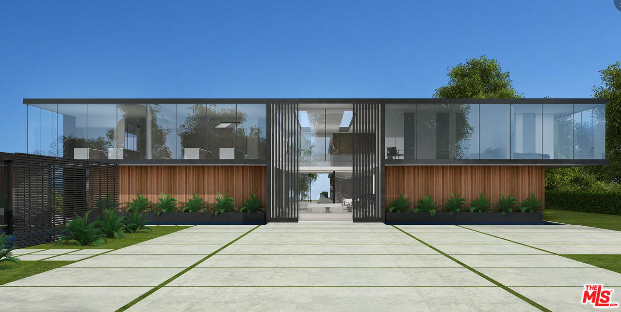 16 Beverly Park Beverly Hills, CA 90210 - Photo 2 of 20 a backyard of a house with lots of green space and plants