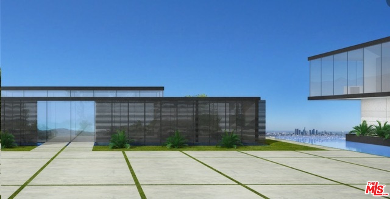 16 Beverly Park Beverly Hills, CA 90210 - Photo 11 of 20 a view of backyard with a potted plants