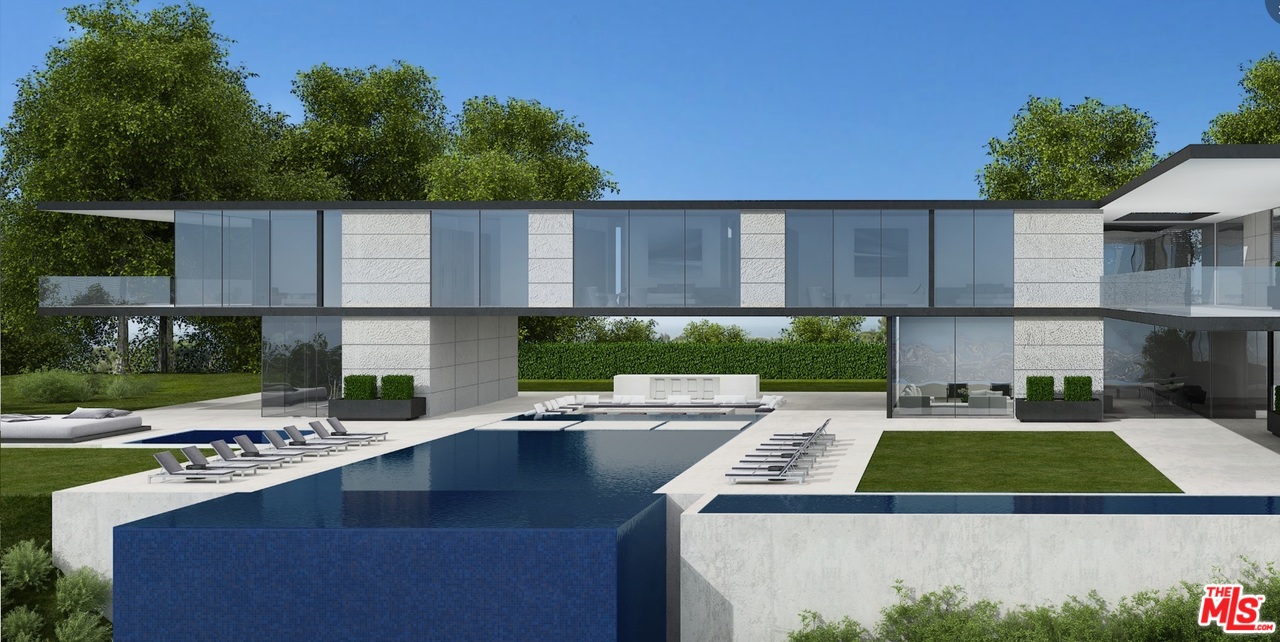 16 Beverly Park Beverly Hills, CA 90210 - Photo 14 of 20 a kitchen with a sink a stove and a microwave