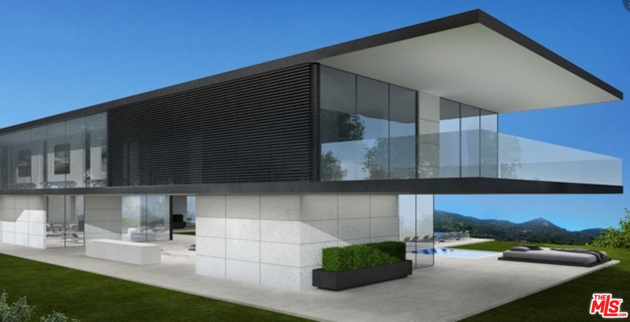 16 Beverly Park Beverly Hills, CA 90210 - Photo 5 of 20 a kitchen with a sink and cabinets