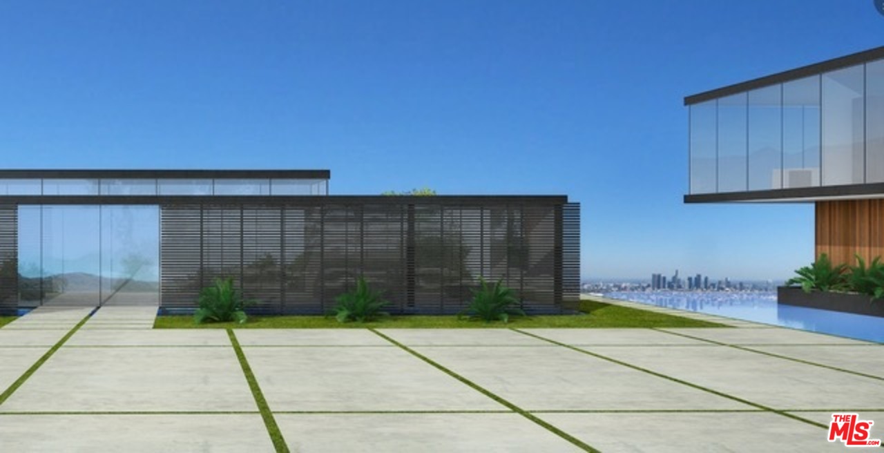 16 Beverly Park Beverly Hills, CA 90210 - Photo 10 of 20 a view of backyard with potted plants