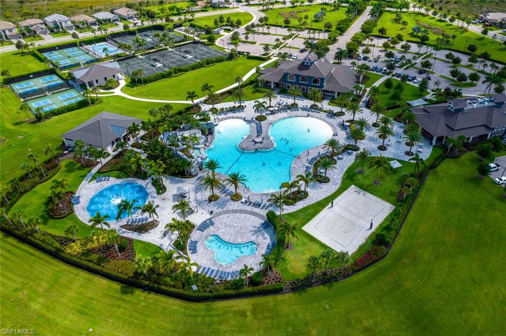 19809 Beechcrest Place Estero, FL 33928 - Photo 29 of 33 an aerial view of residential houses with outdoor space and swimming pool