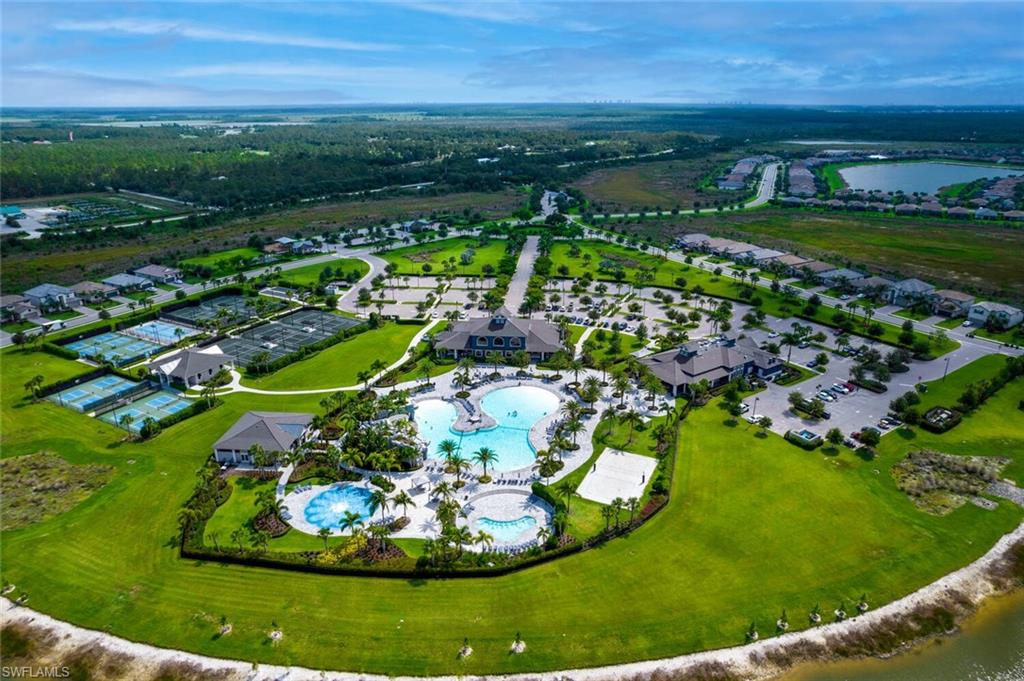 19809 Beechcrest Place Estero, FL 33928 - Photo 32 of 33 a view of a lake with a city