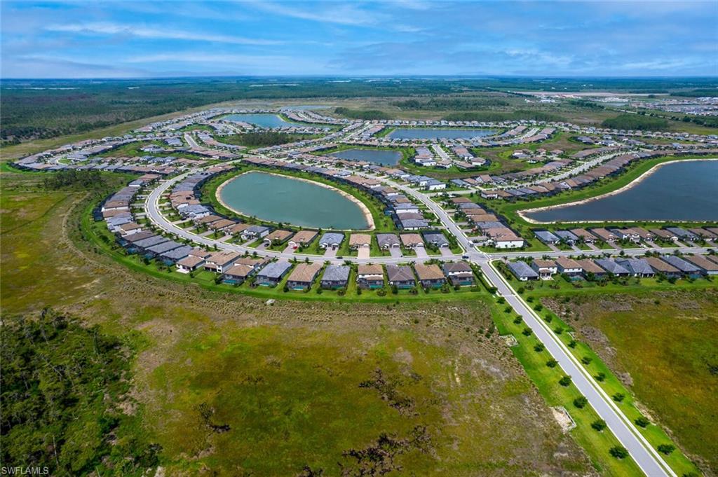 19809 Beechcrest Place Estero, FL 33928 - Photo 33 of 33 a view of a city with an ocean